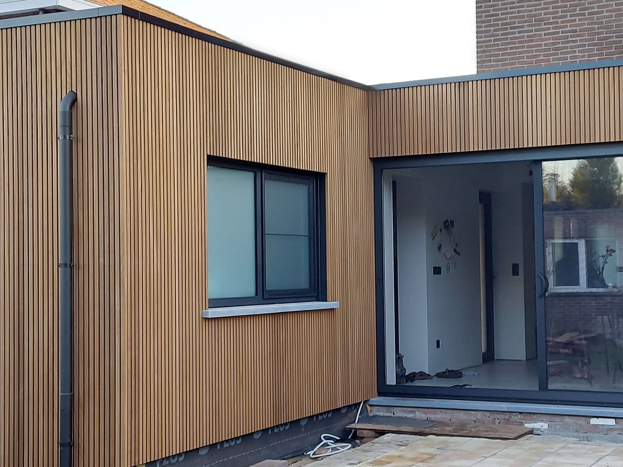 Dakwerken Van Tongerloo – gevelbekleding Nijlen. Thermowood ayous.